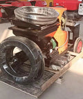 Portable Construction Sand Cement Mortar Spraying Machine With Multifunctional Wall Plaster Stucco Pump on pallet with black wheels.
