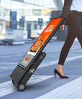 55 Inch Outdoor Digital Signage Display Loaded Up With 4K UHD LCD And IP55 Waterproof Shield Boasting 1800 Nits auto brightness, being wheeled by a woman.