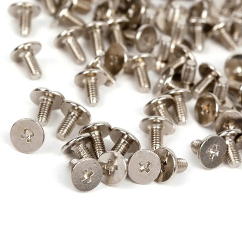 Close-up of metal screws for 12mm Metal Tree Spike Studs Set Of 100 With Screws And Screw Back Fasteners for DIY leather craft.