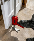 Heavy Duty Arm Jack 2 Pack, Zero Sweat Furniture Lifter, 330 Lbs Hand Lift Tool adjusting a door with foot on jack.