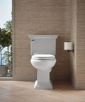 Cachet Round Toilet Seat With Quiet Close Lid, Grip Tight Bumpers, Release Hinges in a modern bathroom scene, white color