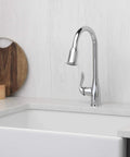 High Arc Pull-Down Kitchen Faucet With Single Lever Handle In Polished Chrome, Easy No-Fuss Operation, Generous Pot Clearance, Dual Spray Modes On Spray Head installed on a countertop.