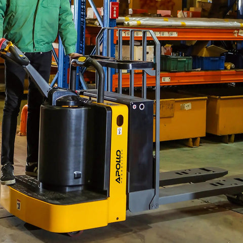 Heavy Duty Electric Pallet Jack Rider Packs Killer Six Thousand Six Hundred Pound Grip And Rock Solid Stand On Base With A Zippy Two Point Two Kilowatt Motor Plus Long Lasting Twenty Four Volt Battery For Zero Stress Warehouse Hauling And Smooth Floor in use on warehouse floor.