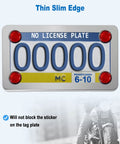 Chrome Stainless Steel Motorcycle License Plate Frame With Red Reflectors And Rustproof Hardware Bolts And Nuts Heavy Duty Tag Plate Holder Bracket Kit For Motorbike Street Bikes on display showing thin edge design and no license plate blocking.