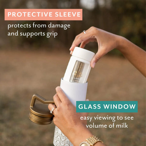 Ultra Wide Neck Glass Breast Milk Storage Bottles For Pumping And Feeding Bpa Free Silicone Caps Fit Most Pumps Aspen White Pair, showing protective sleeve and glass window for volume viewing.