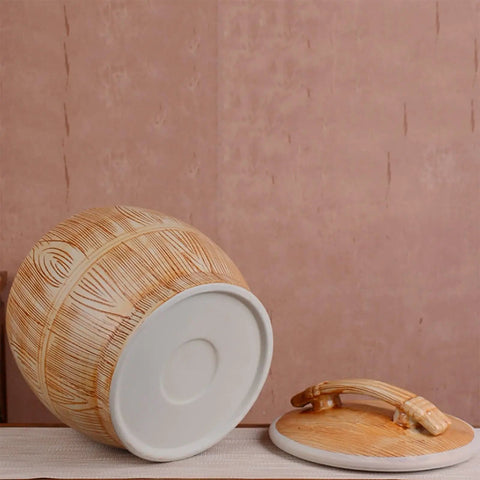 Handpainted Ceramic Rice Dispenser With Secure Airtight Lid, Heavy Duty Kiln Fired Grain Jar on a table