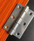 Heavy Duty Stainless Steel Flat Hinges With A Slick Silver Finish 20 Pack close-up view mounted on a wood surface.