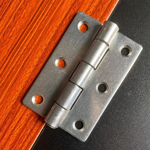 Heavy Duty Stainless Steel Flat Hinges With A Slick Silver Finish 20 Pack close-up view mounted on a wood surface.