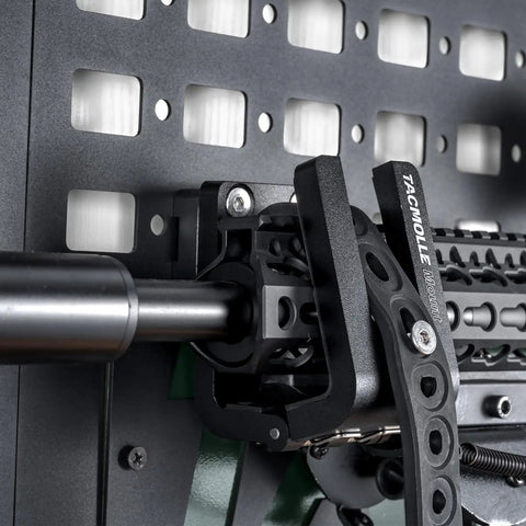 Universal MOLLE Mounting Bracket Base 4 Pack for Panels and Accessories installed on panel, securely holding a cylindrical object.