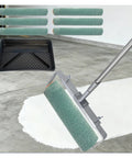 Pro Tier Adjustable Paint Roller Frame With Extended Telescoping Pole And Microfiber Detail Brush Collection on a painted surface with roller covers.