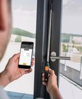 Handheld Air Velocity And Temperature Meter With In-Duct Airflow Measurement, CFM Readout, And A 15 Inch Telescoping Shaft For Easy Spot Checks, Bluetooth Connectivity And Mobile App Control For Quick Duct Diagnostics. used on door frame