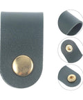 Close-up of dark green artificial leather cord wrap with gold snap for Five Piece Leather Cord Wraps Keep Your Computer Rig Hella Neat With Durable Sock Style Cable Organizers For Usb Chargers Phone Wires And Audio Equipment.