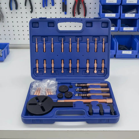 Thinking Process: blue bearing puller set in hard case with steel rods, hooks, adapters, and disc for bearing removal
