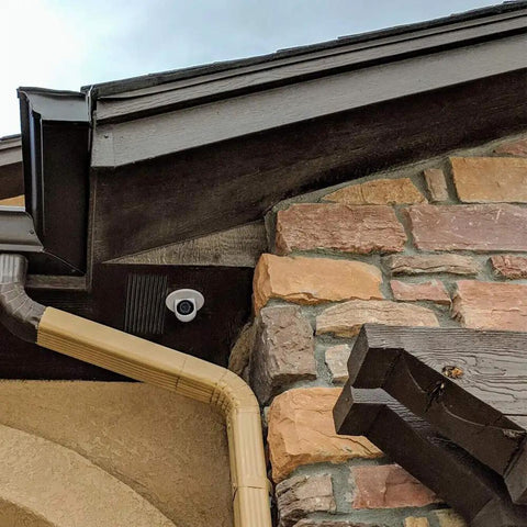 G3 Flex 1080p Indoor Outdoor Security Cam With Night Vision And HDR mounted under eaves, PoE powered, weatherproof for day-night use.