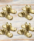 Set of four Hidden Zinc Alloy Concealed Hinges For Doors And Walls on a wooden surface
