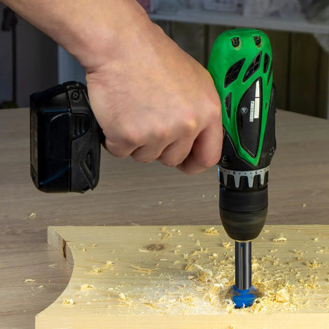 Person using drill with 6 Pcs Collet Adapter Set 12.7mm To 6.35mm Carbon Steel Router Collet Reduction Sleeve on wood