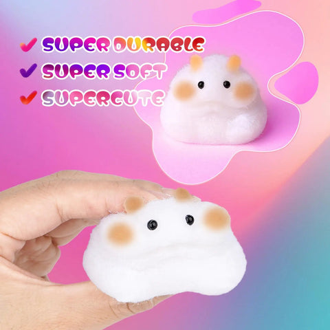 Hand holding a soft, white squishy toy with a cute face, from Ultimate DIY Squishy Kit With 6 Molds And 18Oz Bubble Free Liquid Silicone Quick 2 To 3 Hour Cure With No Fuss Step By Step Guide Perfect Starter Craft Gift For Beginners.