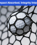 Heavy Duty 10x10 Golf Net For Garage And Backyard catching a golf ball, showcasing reinforced mesh and 1/8 inch rope construction.