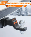 Heavy Duty Trailer Hitch Ball Mount For 2 Inch Receiver With 2 Inch Drop And 2 Inch Ball Includes Hitch Pin Tow Up To 7,500 Lbs GTW And 750 Lbs Tongue Weight Fits Trucks SUVs RVs Boats attached to a vehicle.