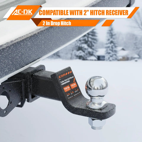 Heavy Duty Trailer Hitch Ball Mount For 2 Inch Receiver With 2 Inch Drop And 2 Inch Ball Includes Hitch Pin Tow Up To 7,500 Lbs GTW And 750 Lbs Tongue Weight Fits Trucks SUVs RVs Boats attached to a vehicle.