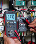 Person using Smart Digital Multimeter UT60S True RMS 9999 Counts 1000V AC DC Voltmeter And Ammeter in electrical panel