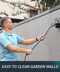 Man using Beast Cordless Portable Pressure Washer With 22L Tank And 12000mAh Battery to clean garden wall