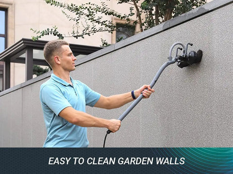 Man using Beast Cordless Portable Pressure Washer With 22L Tank And 12000mAh Battery to clean garden wall