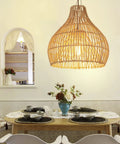 Small Rattan Pendant Light For Kitchen Island With Boho Wicker Chandelier Look illuminating dining area