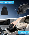 Plug And Play Electric Vehicle Charging Adapter For Tesla Supercharger To Ccs1 Connector resting in a car cup holder, compact design.