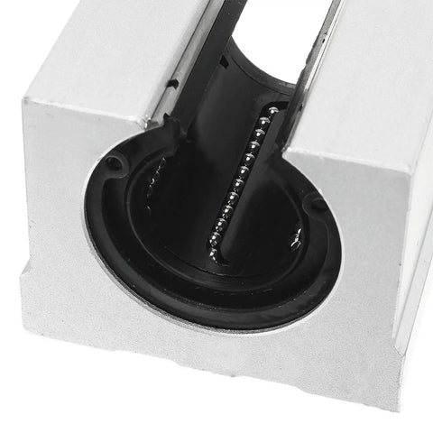 Close-up of the Open Linear Bearing SBR25UU Slide Unit for 25mm Shaft Motion, showing ball bearing in an aluminum pillow block.