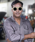 Man wearing Built Tough Welding Glasses and Protective Goggles for Industrial Grinding in a workshop setting.