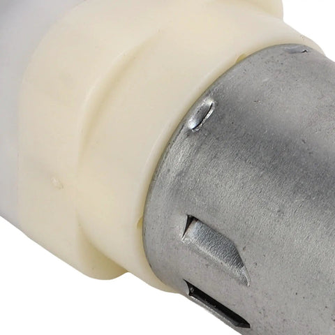 Close-up of Rock Solid Mini Micro Air Vacuum Pump with durable plastic and metal components for quiet low voltage use.