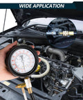 Front view of a hand-held 0-140 PSI fuel pressure tester gauge connected to a car fuel rail; inset shows brass adapter.