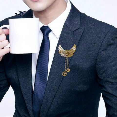 Cool Retro Vintage Industrial Gears Punk Brooch For Men And Women Distressed Bronze Mechanical Lapel Pin with bird design on suit.