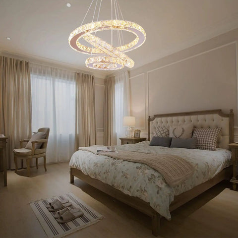 Bedroom with Dimmable LED Three-Ring Chandelier, Crystal Accents, Stainless Steel, Adjustable Ceiling Fixture, Modern Design