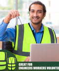 Man wearing fluorescent green 10 Pack Reflective Safety Vests With Pockets And Zipper, working with laptop, indoors.