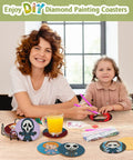 Mother and child using 8Pcs Diamond Painting Coasters With Holder For Diy Halloween Themed Coasters, colorful designs visible.
