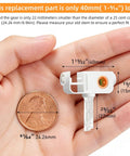 Close-up of hand holding small gear and stem, next to penny, for 20 Pack Replacement Stems And Gears For Standard Vertical Blinds.