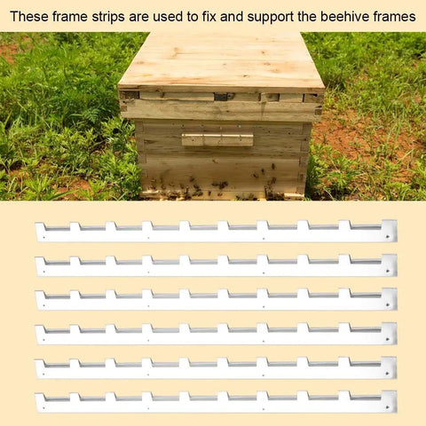 6 Pack Metal Beehive Frame Spacers For Solid Hive Framing Rugged Beekeeping Frame Strips alongside a beehive box on grass