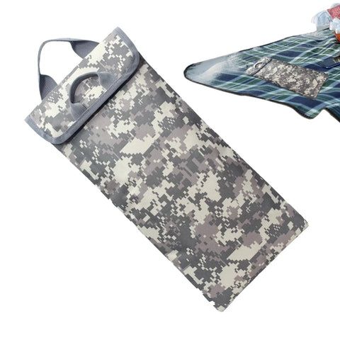 Go-To Hydration Bladder Carrier with 600D Oxford camouflage thermal sleeve, laid on a plaid background.