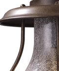 Close-up of Wikshire 8 Inch Wide 1 Light Outdoor Pendant in Coffee Bronze with crackle glass detailing and cast aluminum.