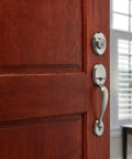 Front Door Lock Handleset With Deadbolt For Exterior Entry In Satin Nickel on wooden door, focus on handle and deadbolt design.