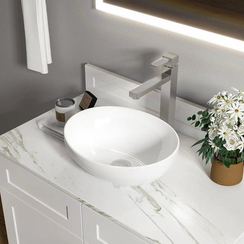 White Rectangular Ceramic Countertop Vessel Sink 24 By 14 By 4.33 Inches in modern bathroom setting with faucet