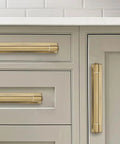 5 Pack 6 Inch Center To Center Champagne Bronze Cabinet Pulls With Backplate And Base Plate Made From Zinc Alloy In Satin Brass Finish installed on grey cabinets