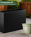 Sturdy 36 Inch Metal Planter Box With Drainage Holes And Rust Proof Coating For Indoor Outdoor Use in a garden setting.
