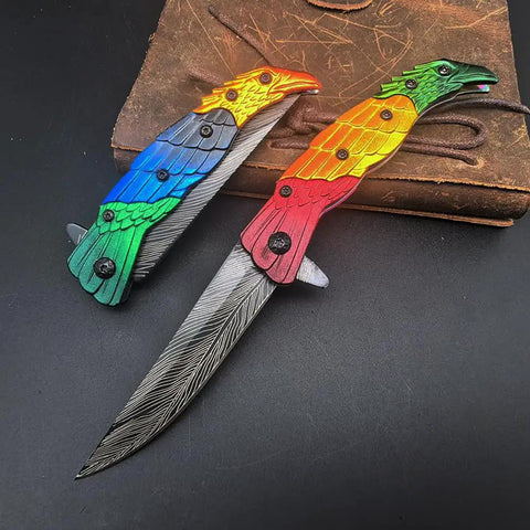 Colorful Eagle Head Embossed Folding Pocket Knife With Damascus Pattern Blade EDC Everyday Carry Utility Knife pictured open and closed.