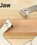 Close up of jaws of Super Tough Locking C Clamp Pliers Set Inch Duty Woodworking Face Tool With Rotating Pads For Welding.