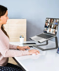 Built To Last Durable Metal Laptop Stand For Desk 10 To 16 Inch Laptops in use on an office desk supporting a laptop