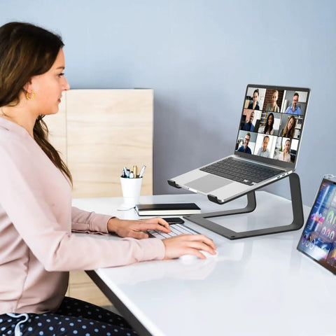Built To Last Durable Metal Laptop Stand For Desk 10 To 16 Inch Laptops in use on an office desk supporting a laptop
