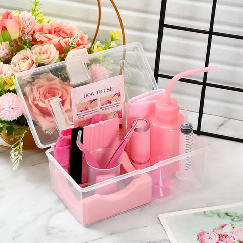 Snow Globe DIY Tumbler Tool Kit For Beginners with storage box, squeeze bottle, funnels, tweezers, and craft accessories in pink.